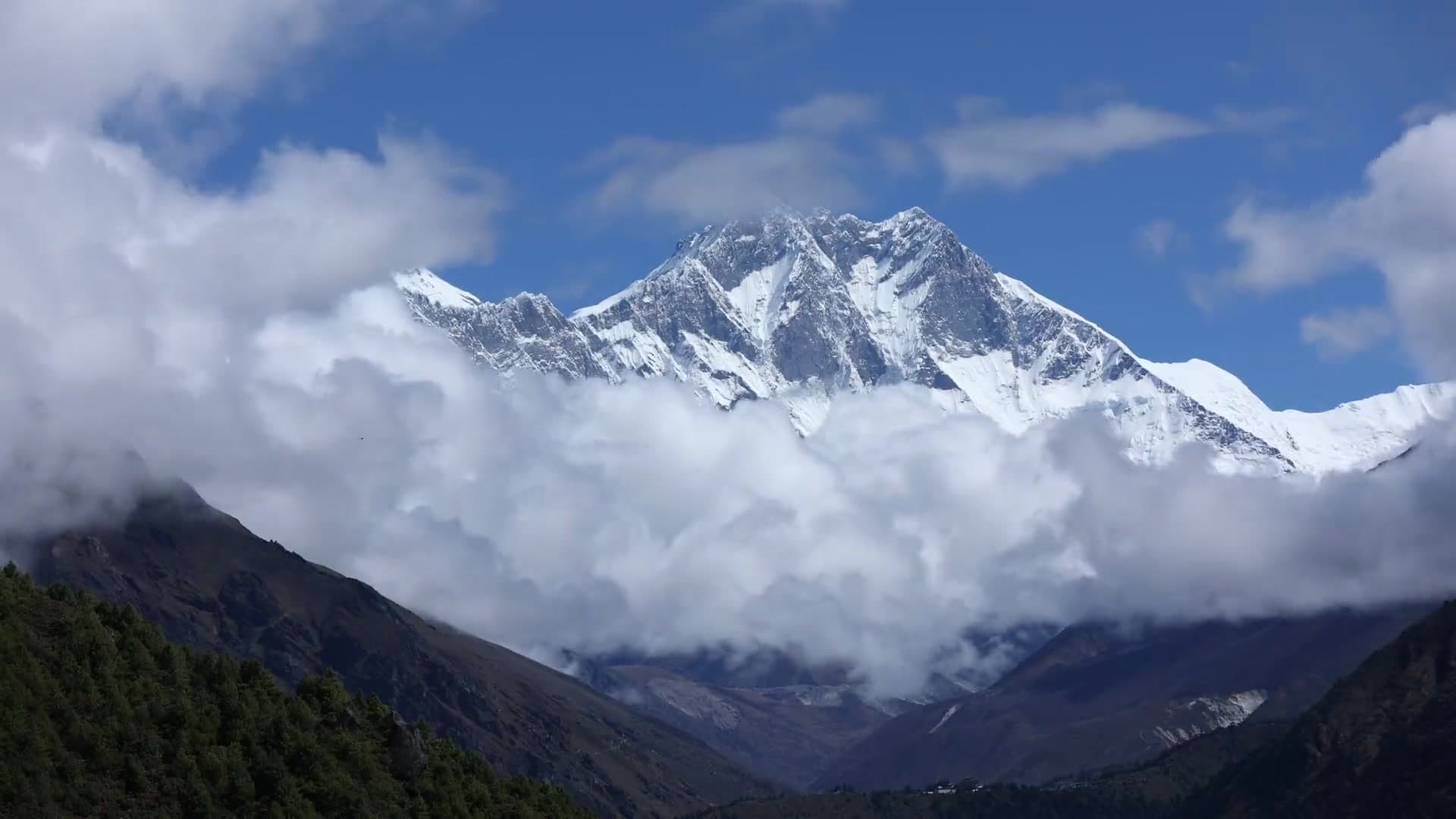 Everest and Lhotse rising above cloud over the Khumbu valley